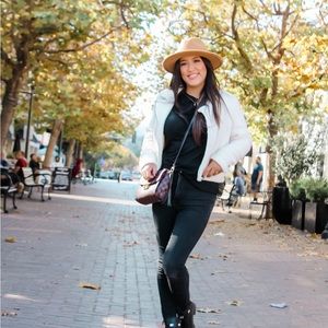 Brown checkered crossbody bag.